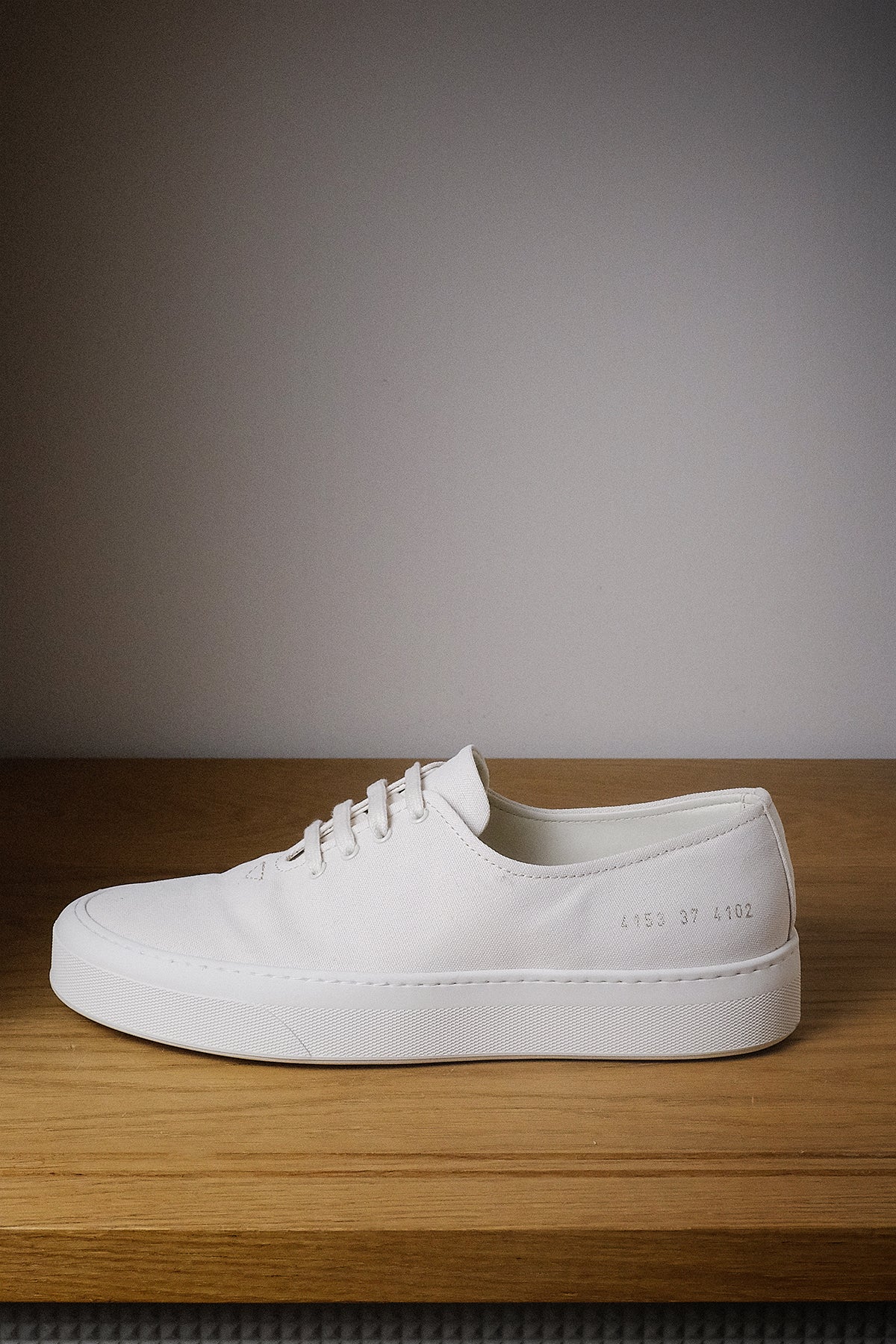 Common Projects — Four Hole Canvas Trainer
